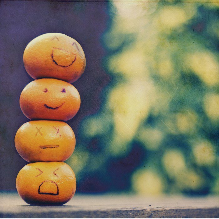 Lustige orange Faces