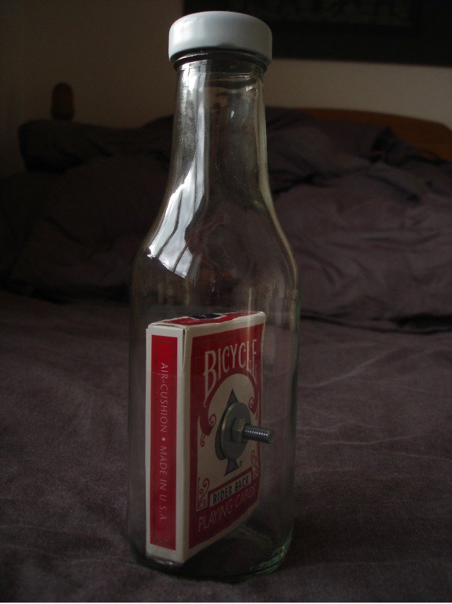 Karten in einer Flasche