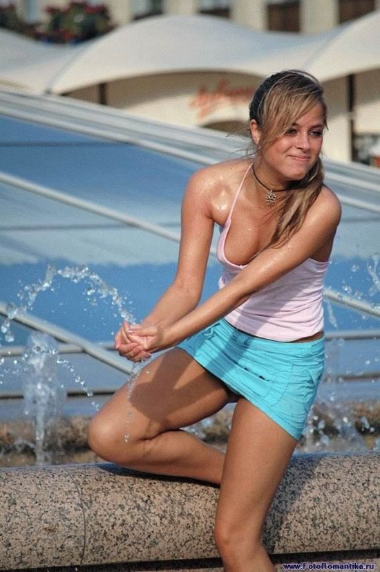 girls cooling in fountains
